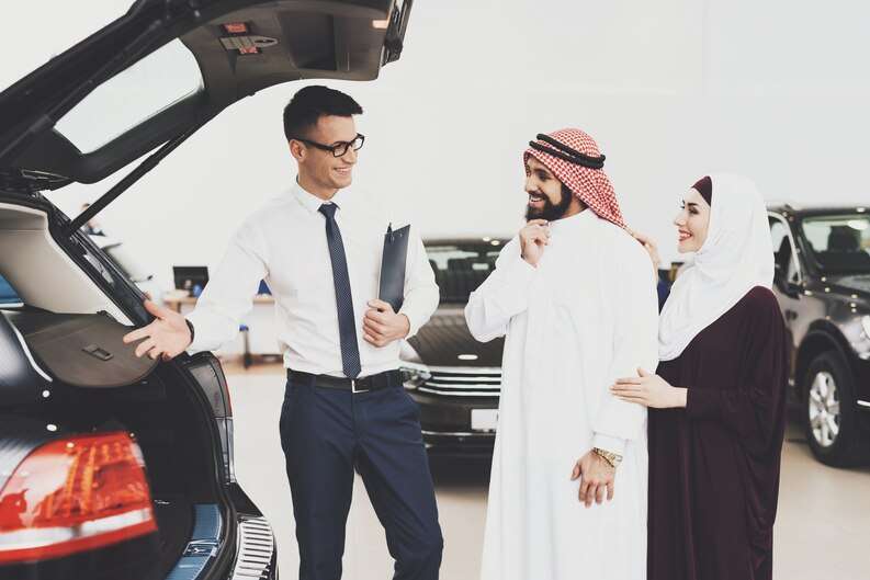 Taxi transporting passengers from Madinah Airport to a hotel taxi, showcasing a comfortable and convenient travel option.
