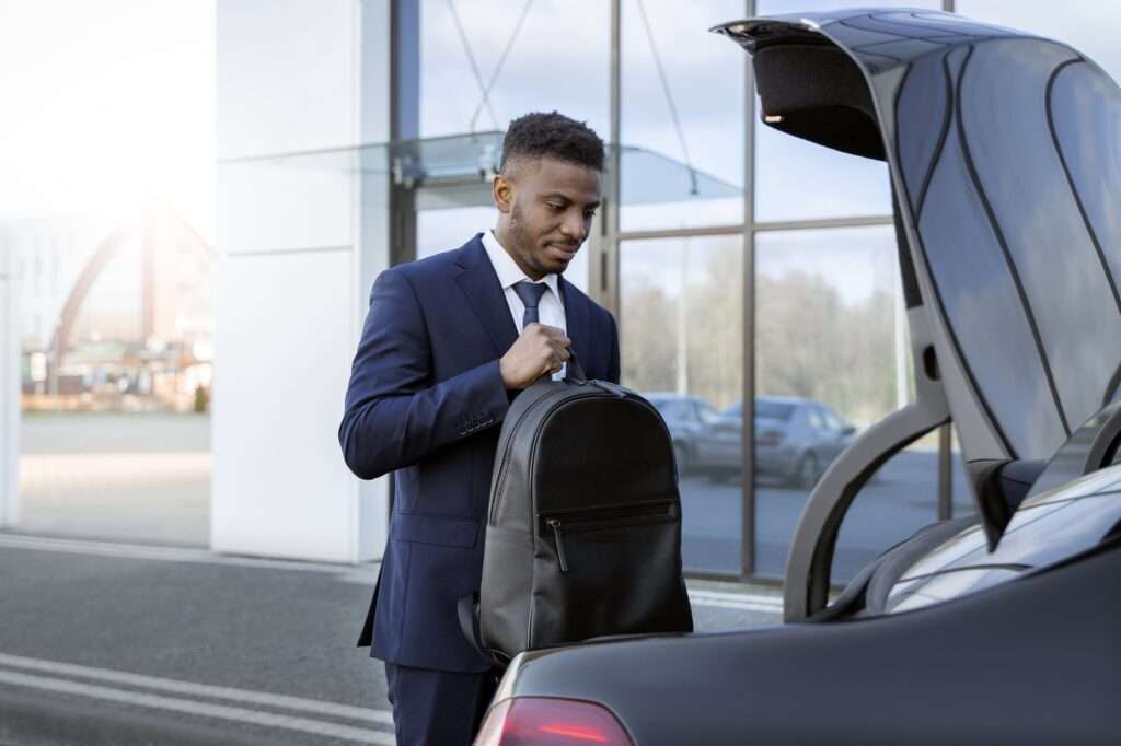 elegant uber driver giving taxi ride