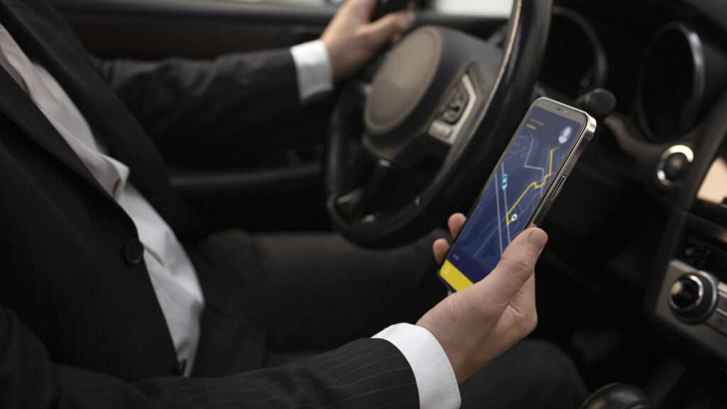 man giving taxi services through app