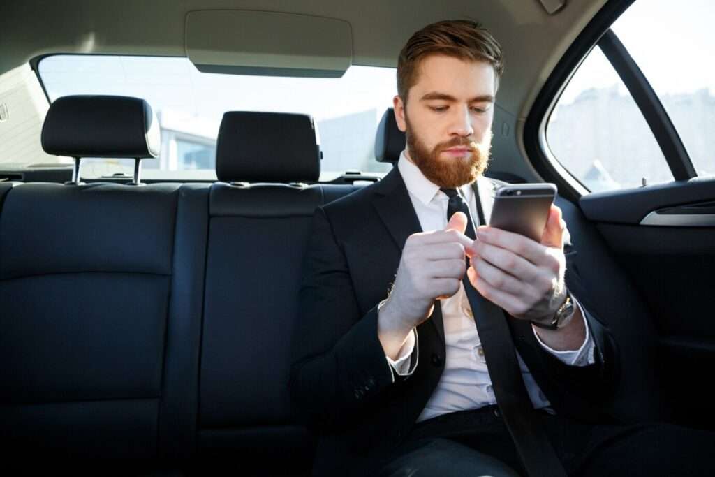 Comfortable vehicle offering Madinah to Makkah taxi services on a scenic highway.
